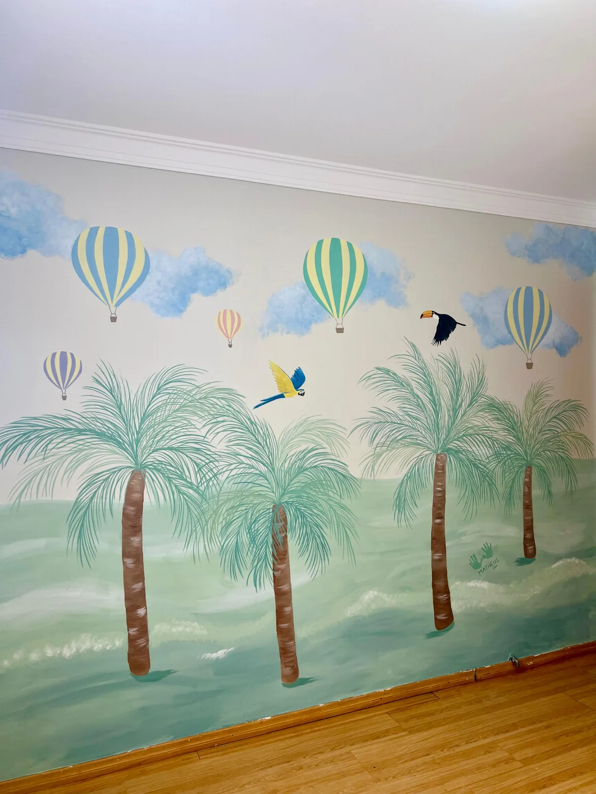 Original photograph of A Sky of Colours, painted by Paloma, featuring palm trees, birds and hot-air balloons