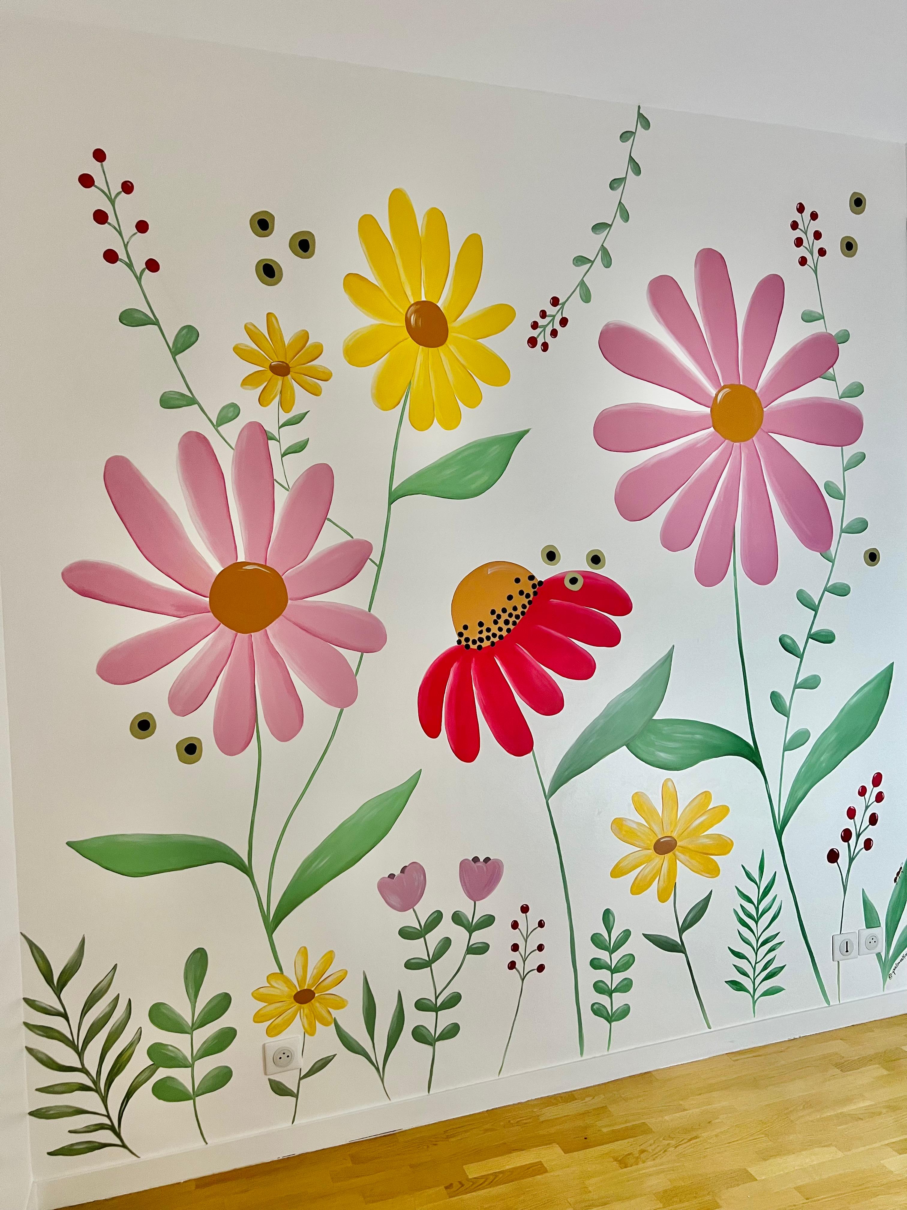 Full view of the floral mural featuring pink, yellow and red flowers