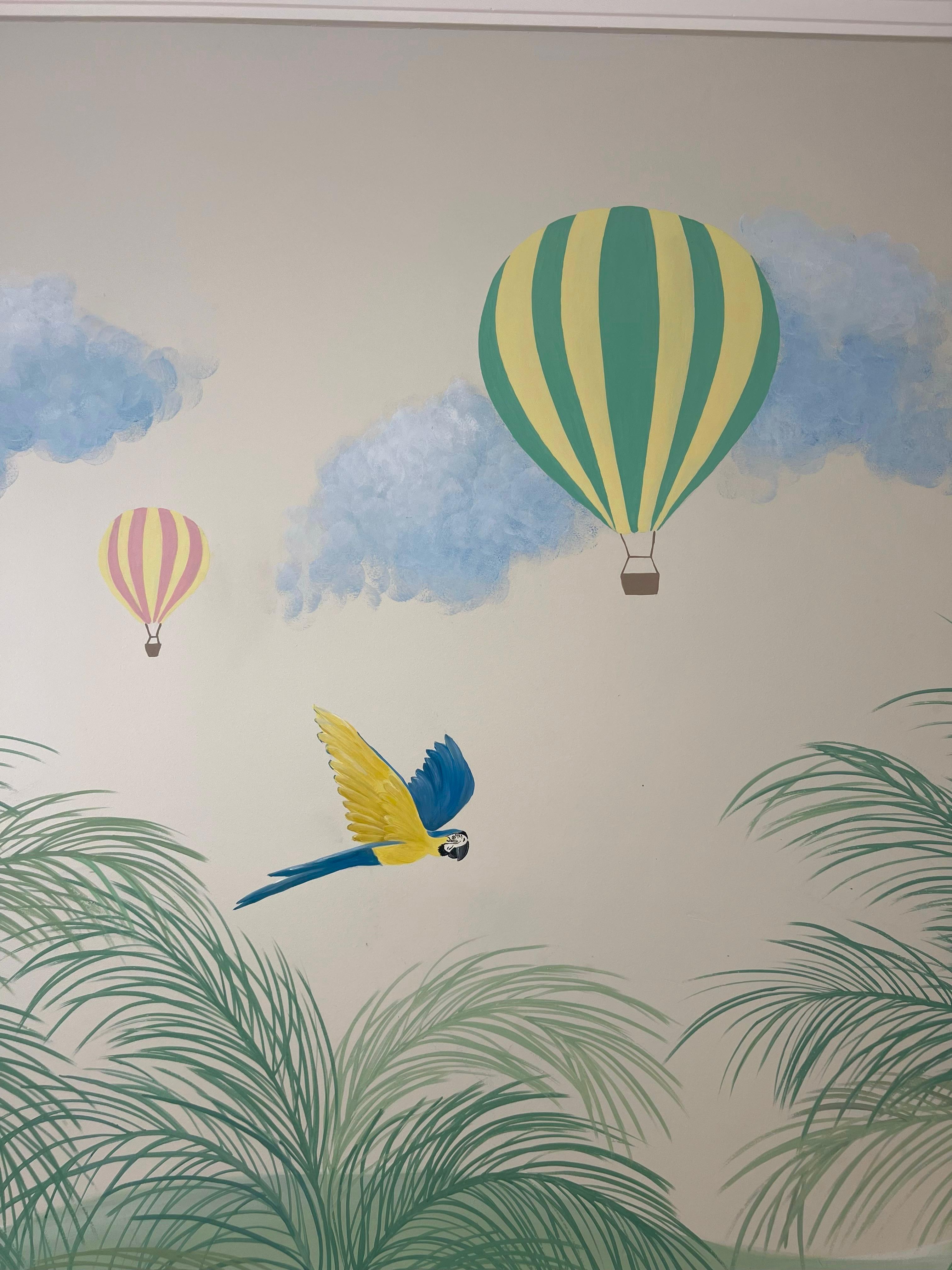 Detail of a flying macaw and colourful hot-air balloons