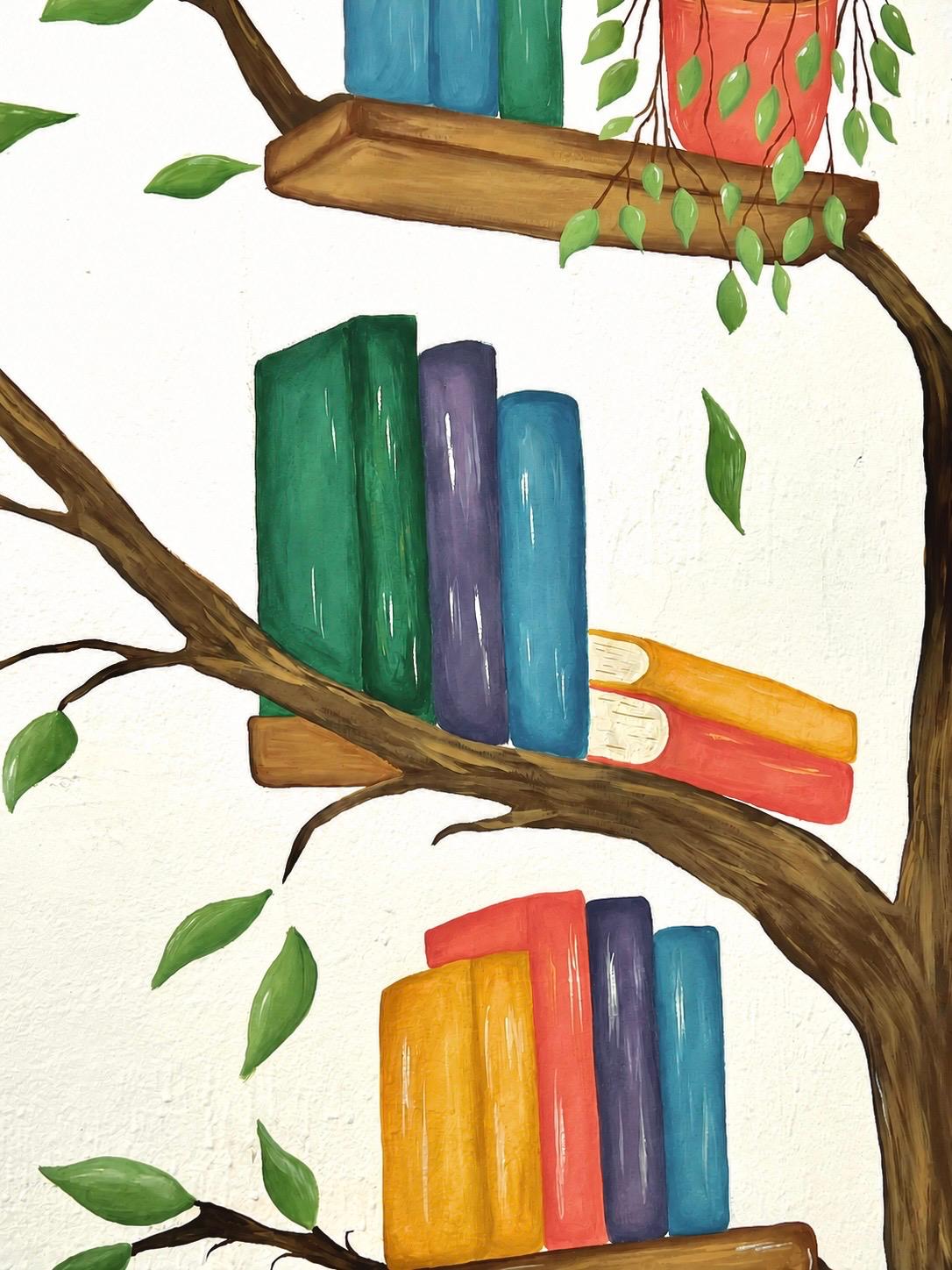 Detail of colourful books and painted branches